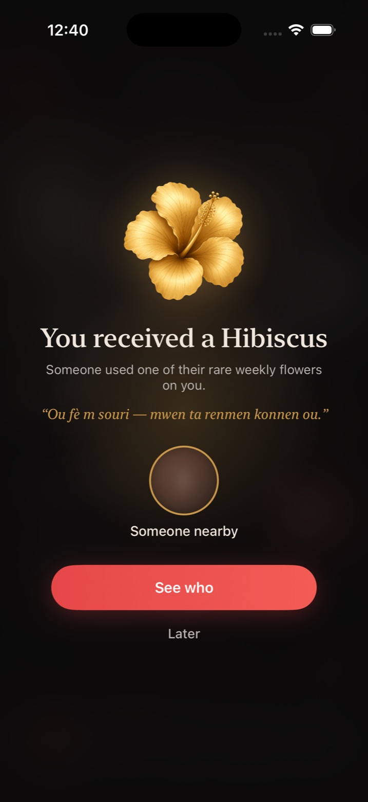 Receiving a Hibiscus in the Flè app — a golden flower with a premye mo written in Kreyòl