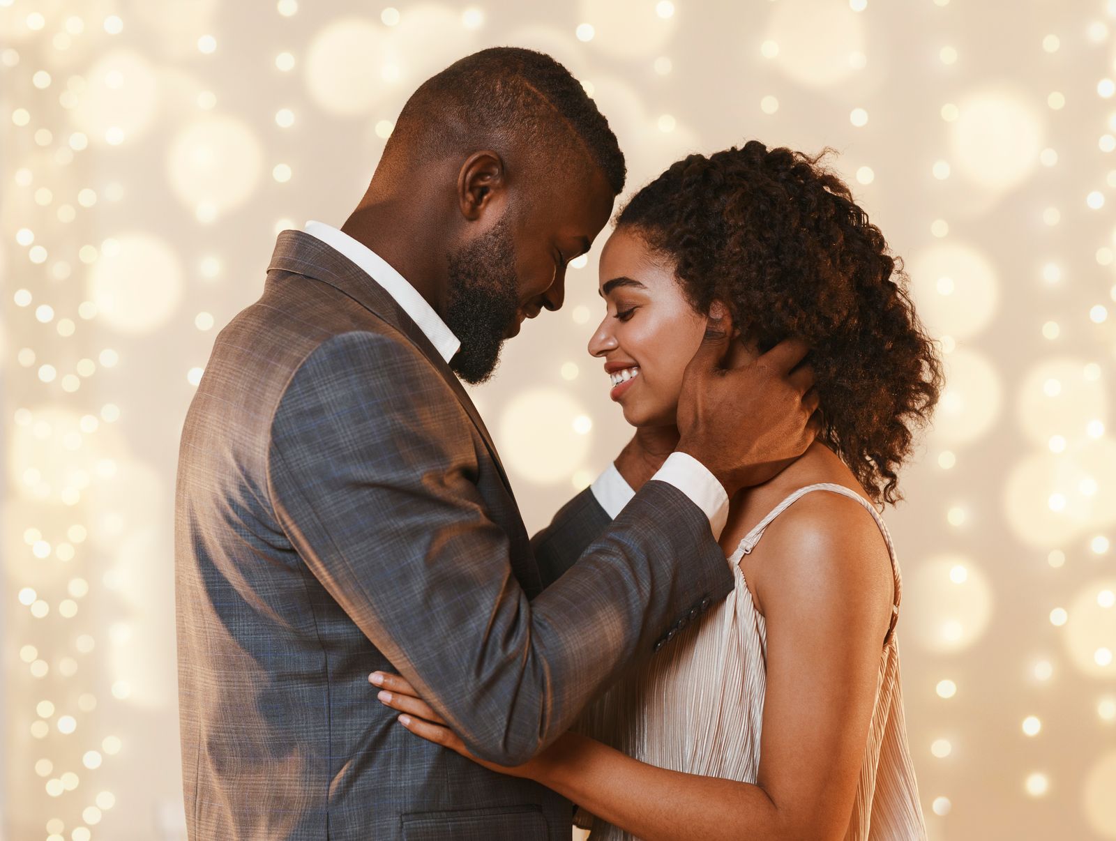 Couple slow dancing in golden light