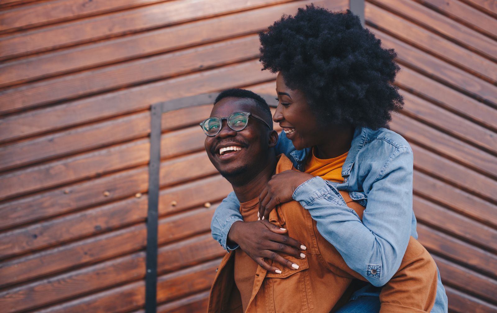 Joyful couple laughing together